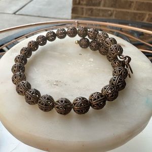 Gold filagree Alex and Ani beaded bracelet